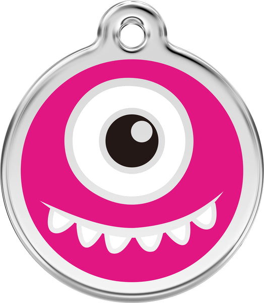 Pink monster-themed pet tag with a black eye and white teeth on a white background