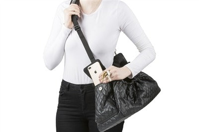 Black quilted sling dog carrier bag with front buckle and adjustable shoulder strap